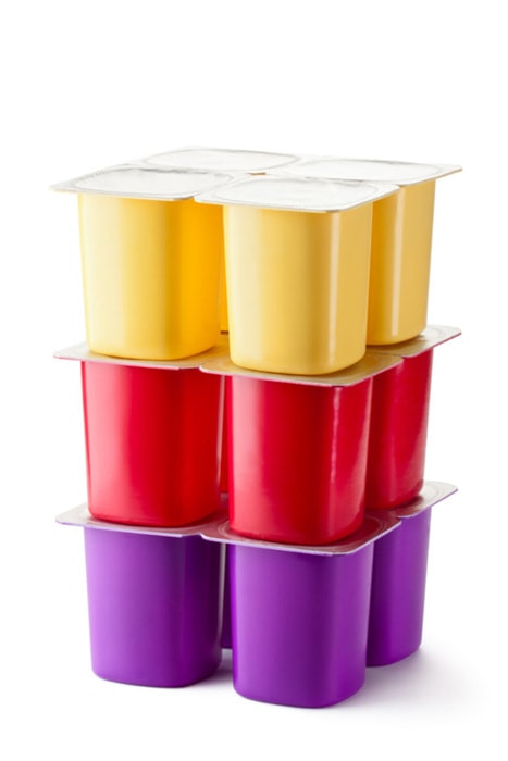 Assorted plastic containers for dairy products with foil lid